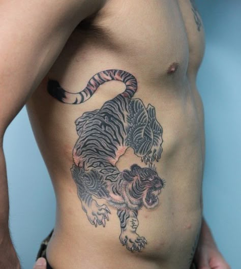 Mens Side Tattoos, Tiger Tattoo Meaning, Mens Tiger Tattoo, Rib Tattoo Quotes, Rib Tattoos For Guys, Tattoos On Side Ribs, Korean Tattoo, Japanese Tiger Tattoo, Cage Tattoos