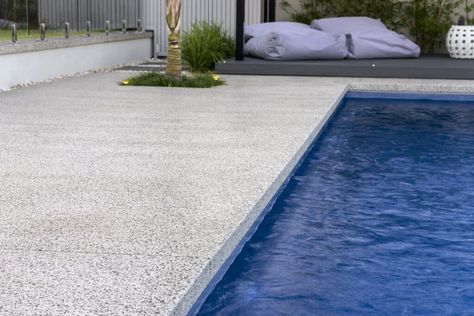 Concrete Around Pool, Ideas For Pool Area, Exposed Aggregate Pool, Pool Area Landscaping, Barrier Reef Pools, Around The Pool Landscaping, Pool Decking Concrete, Honed Concrete, Pools Inground