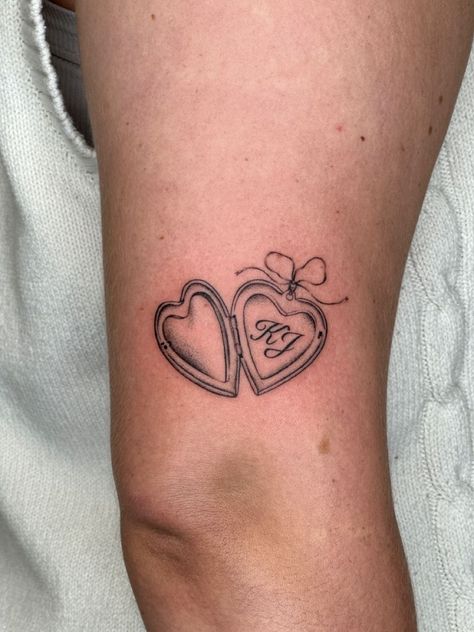 Tattoos You Can Add On To, Initial Memorial Tattoo, Open Heart Locket Tattoo, Coworker Tattoos, Locket Initial Tattoo, Parent Tattoos For Kids, Open Locket Tattoo, Heart Locket Tattoo Design, Grandmother Tattoos