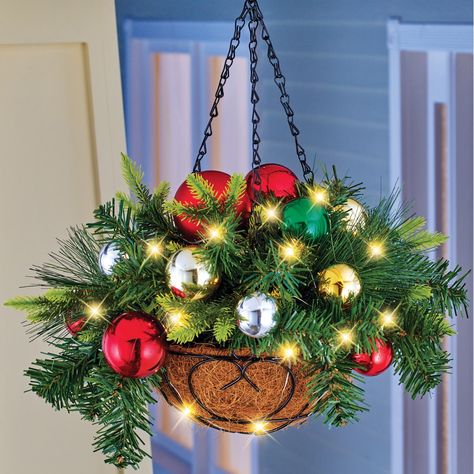 Lighted Ornament Hanging Basket Arrangement with Hook | Collections Etc. Christmas Hanging Baskets, Xmas Decorations Outdoor, Basket Arrangement, Colorful Ornaments, Christmas Planters, Metal Basket, Christmas Hanging Decorations, Christmas Hanging, Christmas Baskets