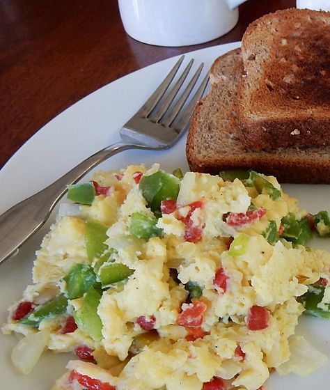 Food for week-end breakfasts and brunches should be special – yet I also want convenience. I found a hundred-year-old recipe that fits the bill. Spanish Scrambled eggs are colorful, tasty, an… Spanish Eggs, Breakfast Eggs Scrambled, Green Pepper, Brunch Ideas, Egg Breakfast, The Bill, Breakfast Brunch Recipes, Old Recipes, Scrambled Eggs