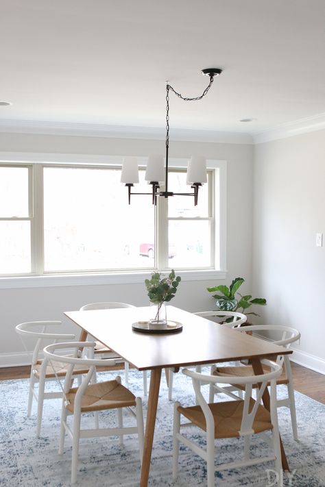 Reviewing this black and white light fixture over this dining room table. It's a swag light and chatting about how it's held up after a year of use #diningroom #lightfixture White Wood Table, Dining Light Fixtures, Interior Design Dining, Dining Room Light, Interior Design Dining Room, White Interior Design, Rustic Dining Room, Farmhouse Dining Table, Dining Lighting