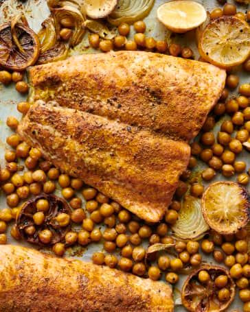 Spice-Roasted Salmon with Lemon and Chickpeas Recipe | Kitchn Caramelized Lemon, Easy Sheet Pan Dinner, Salmon With Lemon, Chickpeas Recipe, Spice Blends Recipes, Easy Sheet Pan Dinners, Yummy Seafood, Curry Spices, Dairy Free Eggs