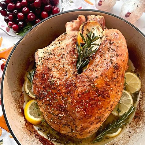 Dutch Oven Turkey Breast is the perfect alternative to roasting a whole turkey during the holidays. It's moist, tender, and loaded with flavor from the dry rub brine, fresh herbs, and juicy lemons! Dutch Oven Turkey Breast, Dutch Oven Turkey, Oven Turkey, Brined Turkey Breast, Oven Roasted Turkey Breast, Turkey Breast Recipes, Wild Turkey Recipes, Cooking Turkey Breast, Oven Roasted Turkey