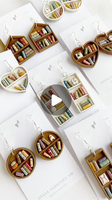 Dasha — Polymer Clay Artist on Instagram: "Books are the keys that unlock the doors of creativity, allowing our minds to soar to unimaginable heights.  And when books and creativity come together, magic happens  #polymerclay #polymerclaycreations #polymerclayjewelry #polymerclayartist #polymerclayart #clayjewelry #polymerclayloves #fimocreations #myfimo #handmade #handmadewithlove #handmadejewelry #handmadegifts #polymerclaytutorial #handmadebooks #bookshelf" Polymer Clay Bookshelf, Magic Clay Ideas, Polymer Clay Books, Clay Artist, Polymer Clay Christmas, Handmade Books, Polymer Clay Tutorial, Polymer Clay Creations, Polymer Clay Art