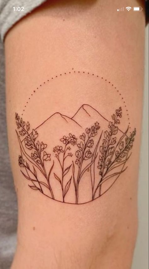 Small Matching Mountain Tattoos, Mountains Flowers Tattoo, Mountain Tattoo Flower, Mountain And Birth Flower Tattoo, Women’s Mountain Tattoos, Pnw Inspired Tattoo, Flowers And Mountains Tattoo, Mountains With Flowers Tattoo, Montana Flower Tattoo