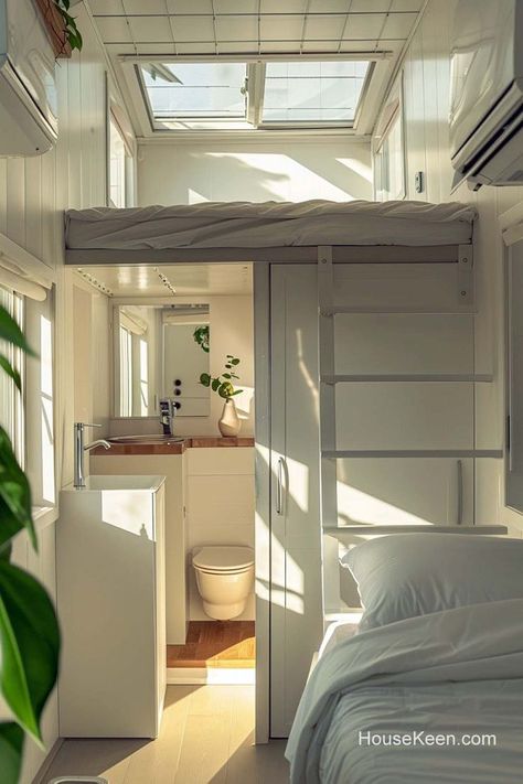 Having a toilet room under a loft bed is a creative space-saving solution. This setup maximizes the vertical space by placing the bed above a compact bathroom area, which can include a toilet and possibly a small sink. Studio With Loft, Tiny House Bed Ideas, House Bed Ideas, Under Loft Bed, Tiny House Bed, Loft Bathroom Ideas, Small Apartment Plans, A Loft Bed, Loft House Design