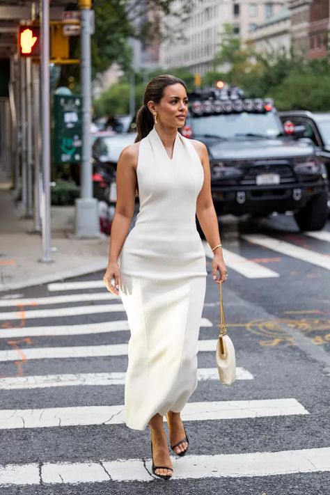 Nada Adelle in a sleeveless white gown with a white a gold bag Nada Adelle, Sleeveless Top Outfit, Wedding Reception Outfit, First Dance Photos, Reception Outfits, Reception Outfit, Modest Casual Outfits, Sheer Pants, Second Wedding