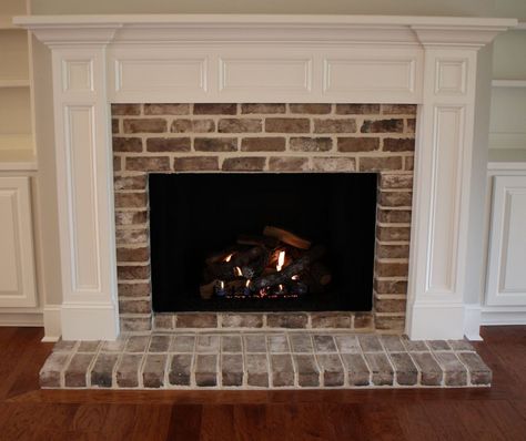 D: Brookhaven Mantel ~ shown with brick surround and low hearth Brick Pavers Fireplace Surround, Low Hearth Fireplace, Electric Fireplace With Brick Surround, Brick And Marble Fireplace, Brick Hearth Fireplace, Brick Gas Fireplace, Brick Fireplace Hearth, Paver Fireplace, Stone Fireplace Hearth