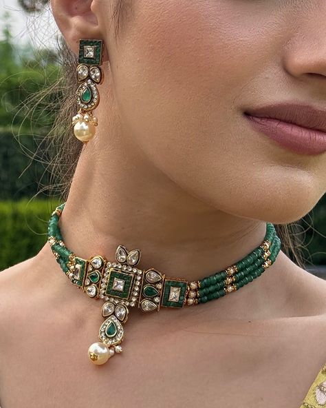 ✨ Kundan Green Majesty ✨ Elevate your style with this stunning Kundan green stone beaded choker and matching earrings set. The intricate Kundan work paired with elegant green stones and a golden touch makes it the perfect statement piece for festive occasions and weddings. 💚✨ #ShivanshriJewelry #KundanElegance #FestiveGlam #TraditionalJewelry Kundan Choker Set, Kundan Work, Kundan Choker, Green Stones, Golden Earrings, Kundan Earrings, Choker Set, Traditional Jewelry, Beaded Choker