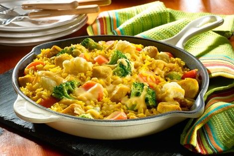 Cheesy Chicken and Vegetable Rice - Recipes | Goya Foods Spanish Chicken And Rice, Vegetable Rice Recipe, Goya Recipe, Chicken And Yellow Rice, Yellow Rice Recipes, Chicken And Rice Recipe, Spanish Chicken, Fried Chicken Breast, Yellow Rice