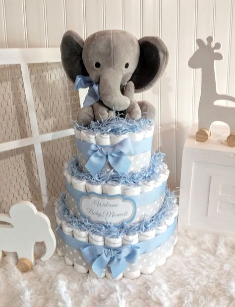 Simple Baby Shower Decorations Boy, Baby Boy Diaper Cake Ideas, Baby Boy Elephant Shower Ideas, Baby Boy Diaper Cake Ideas Diy, Boy Diaper Cake Ideas, Baby Boy Shower Table Centerpieces, How To Make A Diaper Cake For Baby Boy, Baby Shower Boy Decorations, Diaper Cakes For Baby Boy