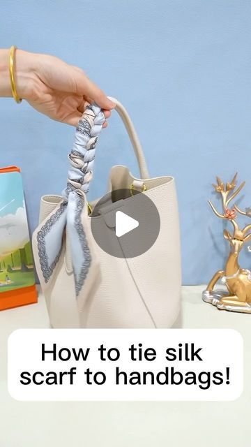 ilymix ❤ on Instagram: "How to tie silk scarf on handbags. #bags #baglover #bagaddict #handbags #handbaglover #handbagaddict #fashionhacks #fashionstyle" How To Put Scarf On Bag Handle, How To Tie A Scarf On A Purse, Handbag With Scarf, How To Tie Scarf On Handbag, How To Tie Scarf On Bag, Tie Scarf On Bag, Scarf On Bag Handle, Tie Silk Scarf, Scarf On Bag