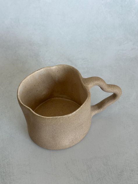 This 'Crush Stone Mug' is a beautiful handmade ceramic coffee mug with a matte finish that adds a touch of elegance to your daily routine. With a generous 15 oz(450ml) capacity, this mug is perfect for enjoying your favorite hot beverages. Each mug is crafted in my home studio in Los Angeles, ensuring that every piece is one-of-a-kind with its own unique characteristics and charming imperfections. Designed for both beauty and convenience, this mug is microwave and dishwasher safe. Please note th Coffee Cup Ceramic, Hand Built Mug, Handmade Mugs, Pottery Teapots, Mug Handmade, Cute Coffee Mugs, Crushed Stone, Teapots And Cups, Ceramics Pottery Art