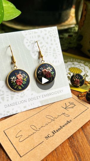 15K views · 2.3K reactions | Tiny embroidered earrings are one of my most-requested items🪡 While they turn out so cute they are double the work… and if you know me well, you know I love making ONE-of a kind things 😉 But when your mom requests a pair of hand-stitched earrings for Mother’s Day…you better believe two free-handed mirroring floral motifs are going to show up on my hoop just for her 💕   This was such a fun stitch and working with new finding is so refreshing! These lovely gold dangle earrings are from my friend @schandworks! She carries lots of embroidery jewelry parts and many come with metal bases just like these earrings did. They are high-quality and perfect for making tiny treasurable gifts to brighten someone’s day 🤗 I highly recommend!  #embroidery #handembroidery #em Diy Embroidery Earrings, Embroidery Earrings, Embroidered Earrings, Gift Crafts, Gold Dangle Earrings, Embroidery Monogram, Fabric Yarn, Embroidery Jewelry, Hand Mirror