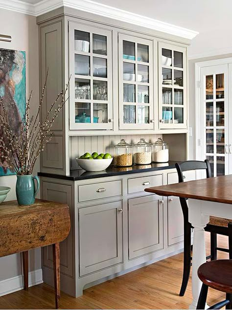 Tiny cooking spaces don't have to be a headache. If you're looking to remodel your kitchen, check out these inspirational photos for ideas on layouts, storage, cabinetry, and more that complement classic decorating styles while staying on budget. Kitchen Hutch, Traditional Kitchen Design, Popular Kitchens, China Cabinets, Kitchen Cabinet Colors, Gorgeous Kitchens, Kitchen Farmhouse, Dream Kitchens, Kitchen Remodel Ideas