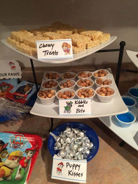 Paw Patrol - Chewy Treats (rice Krispy bars), Kibbles & Bits (Reese's cereal), Puppy Kisses (Hershey's kisses) Paw Patrol Birthday Party Food, Party Food Ideas For Kids, Birthday Party Food Ideas, Food Ideas For Kids, Paw Patrol Birthday Theme, Dog Themed Birthday Party, Puppy Birthday Parties, Hershey's Kisses, Puppy Kisses