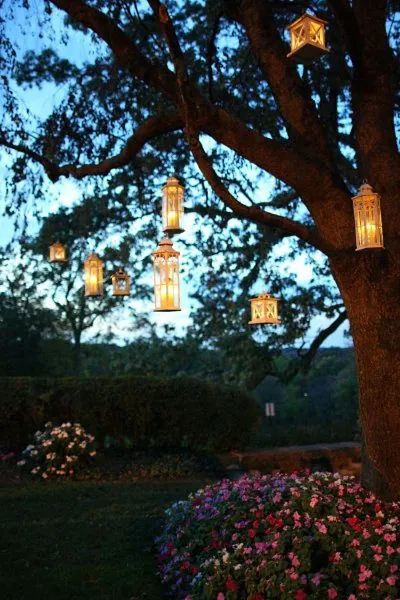 30 Best Landscaping Ideas for Front Yard That Look Appealing Outdoor Lanterns Patio, Lanterns Hanging From Trees, Lanterns In Trees, Wedding Candles Diy, Tree Lanterns, Outdoor Party Lighting, Outdoor Hanging Lights, Candle Light, Outdoor Lanterns