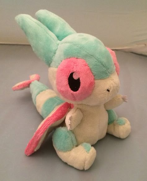 Plush by Shuufly — Pastel Flygon “DX Pokedoll” Plush 8″ tall, minky,... Pokémon Plushies, Pokémon Plush, Pokemon Plushies, Vaporeon Plush, Mudkip Plush, Cat With Pokemon Plush, Sleeping Pokemon Plush, Pokemon Plush Collection, Pokemon Dolls