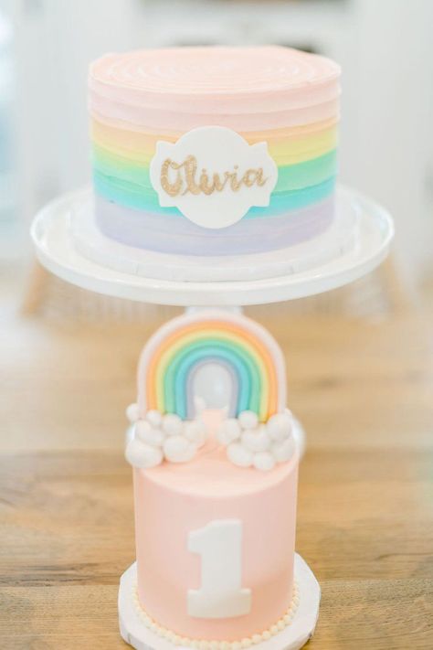 Rainbow First Birthday Cake and smash cake ideas - get details and more Rainbow Party inspiration from event designer Carolina of MINT Event Design in Austin, TX at www.minteventdesign.com! Pastel Rainbow Smash Cake 1st Birthdays, Rainbow Smash Cake 1st Birthdays, Pastel Rainbow Smash Cake, Sweet One First Birthday Cake, Rainbow Smash Cake, Pastel Rainbow First Birthday, Rainbow First Birthday Party, Rainbow Smash Cakes, Pink Smash Cakes