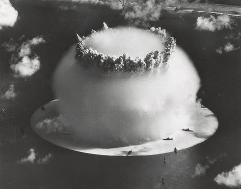 Shot "Baker" of Operation Crossroads (1946) was the first underwater nuclear explosion, a 21 kiloton underwater nuclear weapons effects test by the US at Bikini Atoll in 1946.  The seawater ejected by this test was highly radioactive and seriously contaminated many of the US Navy ships deployed in the test zone.  Those ships which could not be decontaminated were sunk by the US Navy off the coast of San Francisco. Operation Barbarossa, Mushroom Cloud, Nuclear Test, Rare Historical Photos, Marshall Islands, Atomic Age, Hiroshima, Historical Photos, First World