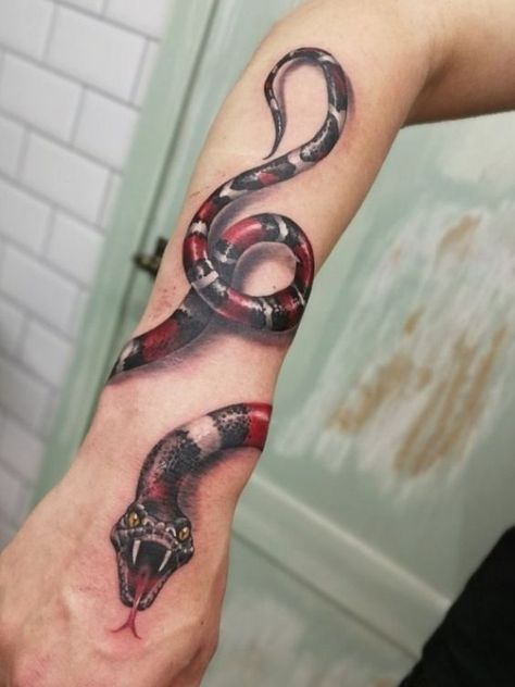 Snake tattoos can mean so much more than you ever imagined. But we are ready to reveal the truth about them and share the most incredible tattoo designs with you. Snake Tattoo Ideas, Black Snake Tattoo, Noir Tattoo, Meaningful Tattoos For Men, Tattoo Snake, Snake Tattoos, Snake Tattoo Design, Red Ink Tattoos, Incredible Tattoos