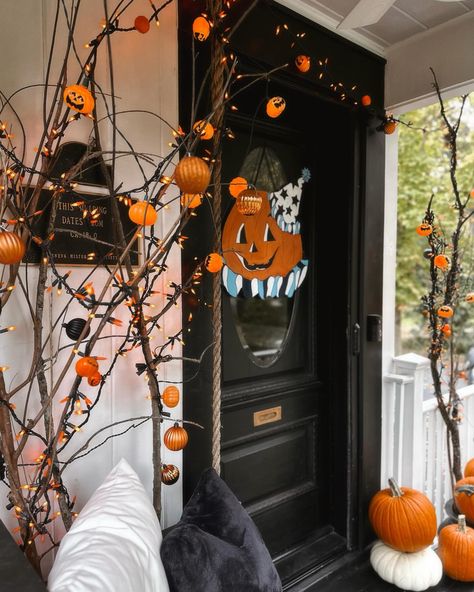 Susan | Our nostalgic Halloween porch makes my heart so very happy! 🎃🎃🎃 I really wanted a front stoop that was reminiscent of childhood, trick or… | Instagram Hanging Pumpkins Front Porches, Halloween Stoop, Hanging Pumpkins, Nostalgic Halloween, Front Stoop, Front Porches, Halloween Porch, Very Happy, Front Porch