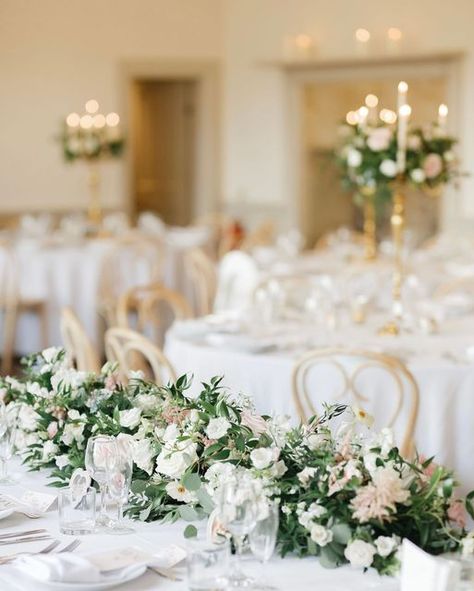 Zoë | Wedding & Event Florist on Instagram: "A gorgeous top table display filled with the finest flowers and foliage!🌿​​​​​​​​ ​​​​​​​​ If you’re using a registrar table during your ceremony, this long and low style arrangement can be used here before we move it across to your reception space. I always advice repurposing your florals throughout your day as much as possible - let’s make sure the flowers are a focal point throughout the day!​​​​​​​​ ​​​​​​​​ Photography @whitestagweddings​​​​​​​​ Registrar Table Flowers, Long And Low Flower Arrangement, Top Table Flowers Long, Pink Flower Centrepiece, Registrars Table Flowers, Pink Floral Centrepiece, Top Table Flowers, Table Floral Arrangements, Pink Wedding Inspiration