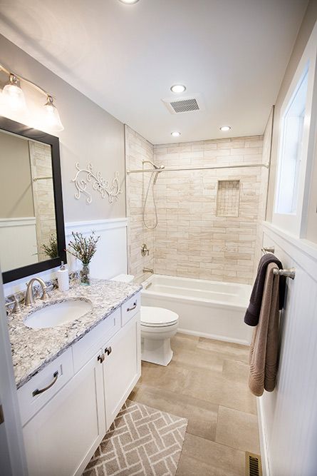 Small Bathroom Ideas Tan Tile Floor, Brown Bathroom Remodel, Bathroom Remodel Cream Color, Hall Bathroom Remodel With Tub, Greige Tile Bathroom, Neutral Bathroom Ideas Earth Tones Master Bath, Bathroom Tile Brown, Tile Half Way Up Bathroom Wall, Simple Guest Bathroom Ideas