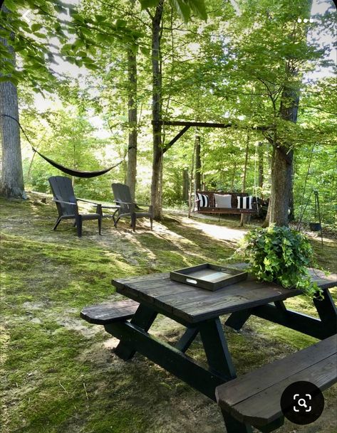 Outdoor Living Space In The Woods, Forest Yard Ideas, Woodsy Yard Ideas, Seating Area In Woods, Patio In Wooded Area, Backyard Woods Landscaping Yard Ideas, House In Woods Landscaping, Rural Backyard Landscaping, Backyard Forest Ideas