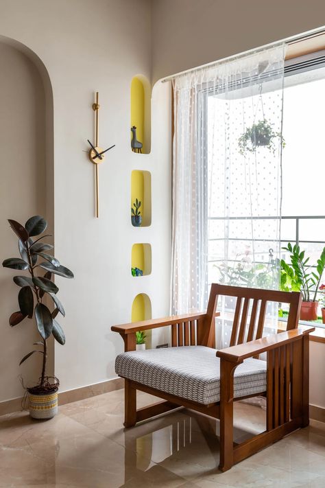 Mumbai: A 2BHK Andheri home that packs colour and smart design in under 700 sq ft | Architectural Digest India Modern Traditional Living Room, Sofa Wall, Traditional Living, Traditional Living Room, Indian Home, A Living Room, Wooden Furniture, Decoration Design, Bed Design