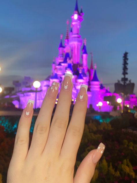 white french tip acrylic nails in shape - square - with mickey mouse faces at the bottom if the nail except the ring finger and thumb 🫶🏼 Florida Trip Nails, Disney Square Nails, Mickey French Tip Nails, Disney Nails Acrylic Short, White Mickey Nails, Mikey White Nails, Disney Nails Acrylic Square, Disney Nails Square, Mickey Mouse Nails French Tip