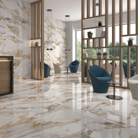 Arezzo Gold marble effect porcelain tiles.A unique and very elegant tile with a wonderful polished finish and very distinctive gold veining on a white background.  This timeless and distinctive tile is ideal for bathrooms and floors and is available in a range of sizes.Consider 1200 x 600mm on the wall and 600m x 600mm on the floor in a bathroom.  If you want to create the “WOW “factor this tile should be seriously considered,a tiled floor is simply stunning. Room Tiles Design, Living Room Floor Tiles, Bedroom Tile, Floor Tiles Design, Marble Flooring Design, Tile Floor Living Room, Escalier Design, Marble Floors, Elegant Tiles