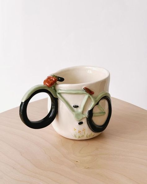 Love in Pottery on Instagram: "beautiful ceramic mug by @huda_marhoon ! 🙈😘💚 FOLLOW👉 @loveinpottery for more pottery contents ☕️ !  visit their page and support 💕  Follow us on @musthomeguide (Interior Lovers) & @mustvisitguide (Travel Lovers) !  #wheelthrown #handmadeceramics #ceramique #ceramicstudio #interiordesign #pottery #artist #ceramicart #ceramicsculpture #handmade #porcelain #contemporaryceramics #ceramica #ceramic #glaze #sculpture #pottersofinstagram #homedecor #ceramics #craft #design #clay #tableware #instapottery #ceramicartist #stoneware" Ceramics Cups Handmade, Sculptural Mug, Ceramics Throwing Ideas, Quirky Pottery Ideas, Ceramic Mug Diy, Ceramic Cute Ideas, Ceramic Mug Ideas Handmade, Ceramic Mug Handmade, Handmade Cups Ceramic Pottery