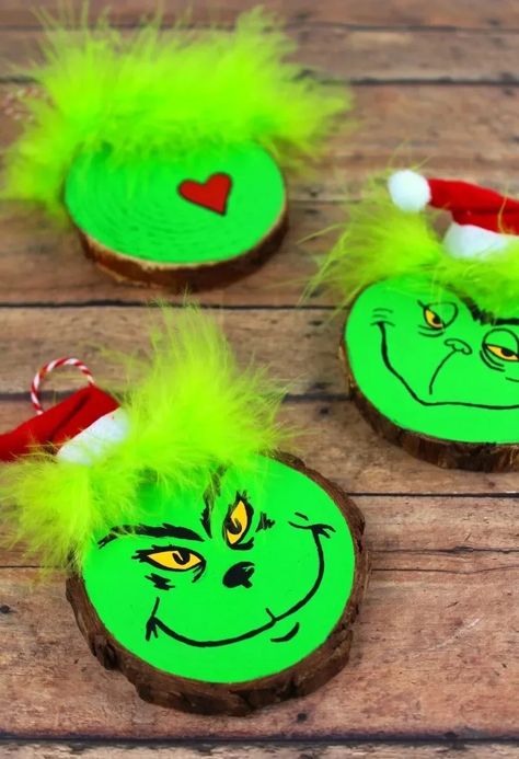 You're going to love these wood slice ornament ideas perfect for your Christmas tree or handmade gifts! These use a variety of craft materials and are great for beginners. Grinchmas Shirts, Diy Penguin Ornament, Wood Slice Ornament Ideas, Whoville Christmas Tree, Grinch Craft, Grinch Gifts, Diy Grinch, Mickey Mouse Ornaments, Grinch Crafts