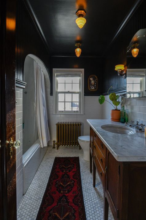 Rare Form Properties Small Black Tile Bathroom, Black And White Interior House, Moody Master Bath Inspiration, Statement Bathroom Ideas, Dark Ceiling Bathroom, His And Her Bathroom Ideas, Dark Washroom, Long Bathroom Layout, Black Master Bath