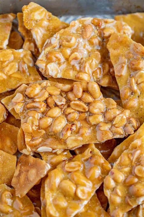 Copycat Sees Peanut Brittle Recipes Peanut Brittle Recipe Easy, Candy Bars Recipes, Best Peanut Brittle, Easy Peanut Brittle, Easy Peanut Brittle Recipe, Sees Candy, Chocolate Covered Coconut, Cheese Logs, Homemade Peanut Brittle