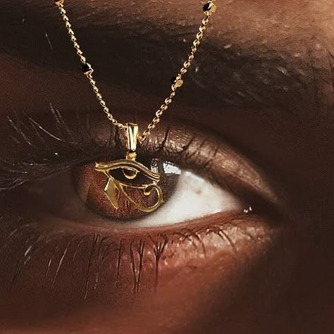 .:. E Y E O F H O R U S .:. Our 22K Gold Plated Eye of Horus Necklace, an ancient symbol of protection and wisdom, carries with it a profound mystique that transcends time. With its captivating design, this symbol reflects the watchful gaze of the falcon-headed god, Horus. Each intricately detailed line tells a story of resilience and divine insight. Embodying the eternal power that has fascinated and inspired for millennia. Eye Of Ra Aesthetic, Eye Of Horus Aesthetic, Egyptian Gold Aesthetic, Egyptian God Aesthetic, Gold Eyes Aesthetic, Protect Aesthetic, Dark Gold Aesthetic, Gold And Black Aesthetic, Protective Aesthetic