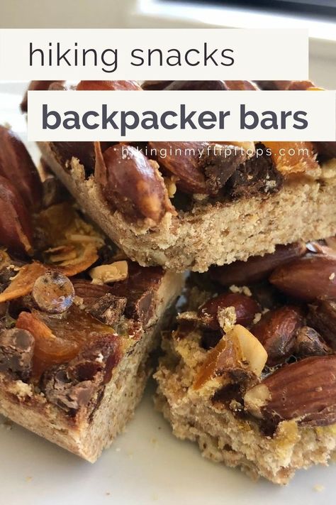 a stack of cut up hiking snack bars with nuts, dried fruit, and whole grains Hiking Snacks Backpacking Food, Packable Meals, Hiking Food Ideas, Trail Mix Bars, Homemade Snack Bars, Portable Meals, Easy Campfire Meals, Dehydrated Meals, Cabin Food