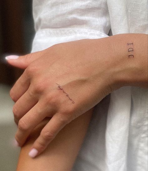 Script On Hand Tattoo, Fine Line Tattoo On Hand, Name Tattoos Hand, Joyful Tattoo, Lover Tattoo Word, Small Tatoos Woman, Minimal Hand Tattoo, Name Tattoo Placement For Women, Small Cursive Tattoo