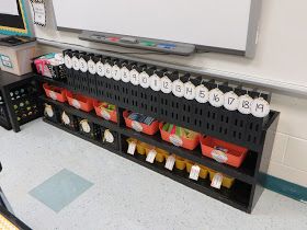 Read, Run, Teach: 2015-16 Classroom Reveal!! Under Whiteboard Storage, Student Chromebook Storage, Under Teacher Desk Storage, Class Chromebook Storage, Under Smartboard Storage, Smart Board Decorations, Whiteboard Storage Classroom, Chrome Book Storage Classroom, Chromebook Organization In The Classroom