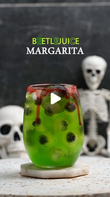 Everyday Cocktail on Instagram: "Another spooky cocktail! 🎃 Beetle Juice Margarita – it’s a fun way to celebrate a Halloween party. Believe me, the color is fantastic, and the blueberry ice is a great idea that gives you a spooky vibe 👻.

Recipe

🫐 Blueberries for the eyes (ice sphere)
🍹 2 oz tequila
🍏 1 oz sour apple pucker
🍈 1 oz Midori liqueur
🍋 1 oz lime juice

#HalloweenCocktails #PumpkinMargarita #SpookySips #FallFlavors #HalloweenVibes #EverydayCocktail #PumpkinEverything #TrickOrTreat #FallDrinks #beetlejuice
#alcohol #bar #bartender #bartenderlife #cocktailrecipe #cheers #cocktail #cocktailart #cocktailbar" Beetlejuice Cocktail, Beetlejuice Party, Sour Apple Pucker, Disney Villain Party, Ice Sphere, Juice Party, Apple Pucker, Halloween Party Planning, Alcohol Bar