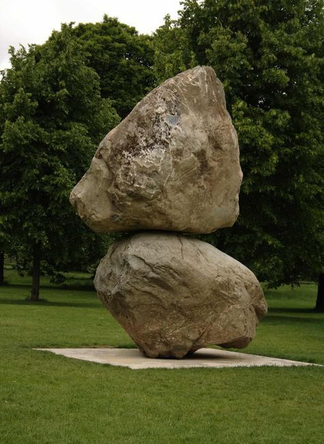 A large rock and boulder sculpture in the middle of a sculpture garden. - Get inspired to create stone garden cairns for navigation, monument marking, fountains or to just get all the rocks out a gardeners way. Pretty rocks and stones can become a rock art. Stacking and balancing inspirational rocks are a timeless element of garden design. rock art ideas Big Rocks In Landscaping, Fx Design, Rock Art Ideas, Daffodil Images, Stone Landscape, Sculpture Fountain, Stone Cairns, Inspirational Rocks, Contemporary Garden Design