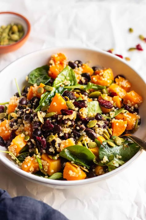 This Roasted Butternut Squash, Black Bean And Quinoa Salad is one of the easiest, most flavorful fall salad recipes, full of nutrients and healthy ingredients. Served warm or cold, this delicious salad is also a great make-ahead lunch for work or back to school. Butternut Squash Black Bean Orzo, Lentil Butternut Squash Salad, Roasted Butternut Squash Pasta Salad, Spinach Squash Salad, Squash Black Bean Soup, Squash And Black Bean Recipes, Quinoa Recipes Butternut Squash, Black Beans And Butternut Squash, Beans Squash And Corn