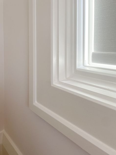 Elegant Molding Trim Ideas: Enhance Your Home's Finished Look (Photos) - Your Designer BFF Interior Trim Baseboard, Framed Windows Molding Trim Work, Modern Farmhouse Molding, Modern Farmhouse Window Trim Interior, Modern Millwork Details, Coastal Window Trim Ideas, Modern Trim Window, Base Molding Ideas Trim, Finish Carpentry Ideas Trim Work