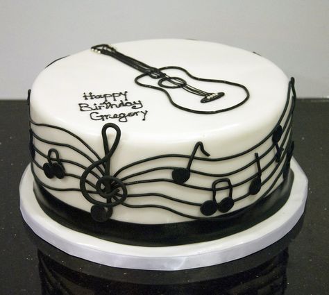 A black and white musical/guitar cake for a musician's birthday. Created by… Guitar Birthday Cakes, Music Note Cake, Bolo Musical, Music Themed Cakes, Piano Cakes, Music Cakes, Music Cake, Guitar Cake, Cakes For Men