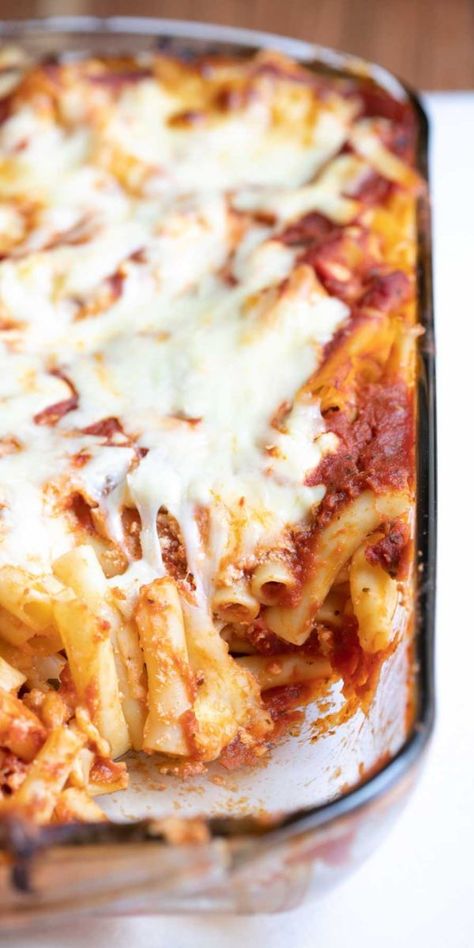 This cheesy baked ziti is the ultimate ziti pasta bake made with only four ingredients: ziti, pasta sauce, mozzarella, and ricotta. It only takes 15 minutes of hands-on time, and it's a pasta dish perfect for the whole family. Vegetarian Baked Ziti, Meatless Baked Ziti, Cheesy Baked Ziti, Italian Pasta Bake, Baked Ziti With Ricotta, Baked Ziti With Sausage, Baked Cream Cheese Spaghetti, Weeknight Pasta, Easy Baked Ziti