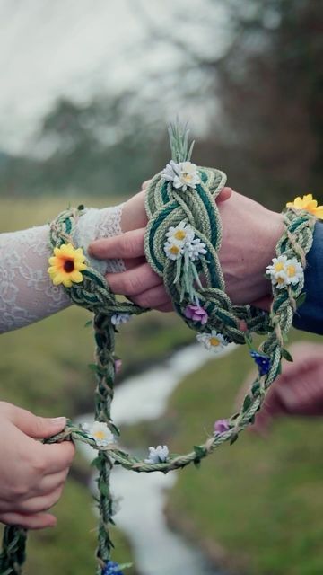 Ceotha | Handfasting Cords on Instagram: "Which cord from our NEW Spring collection are you tying the knot with?   Shop these cords via the Etsy link in our bio! Under the Spring 2024 collection.   #floralwedding #handfasting #handfastingceremony #floralsinspring #handfastingcord #forestmeadow #roses" Celtic Knot Tying Ceremony, Handfasting Ceremony Ideas, Hand Fasting Wedding, Handfasting Pictures, Tying The Knot Ceremony, Knot Tying Ceremony Wedding, Wedding Knot Tying Ceremony, Handfasting Cords Colors Meaning, Hand Tying Ceremony