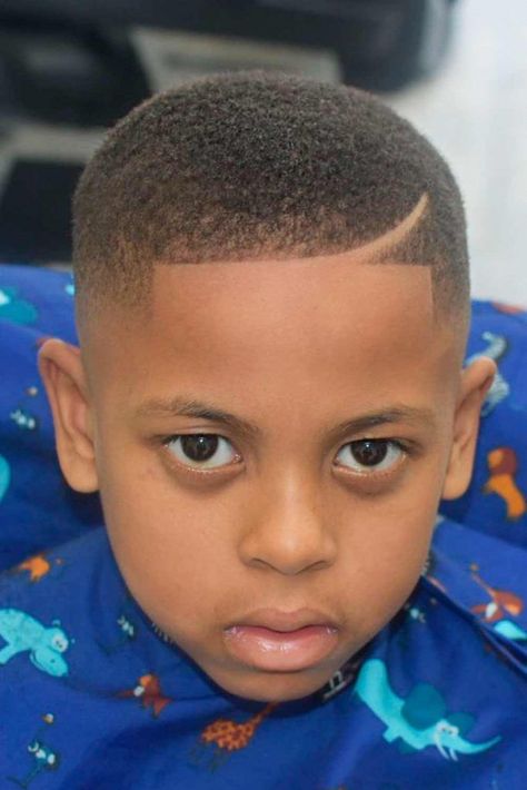 Black Boys Haircuts And Hairstyles (2021 Update) | MensHaircuts.com Black Boys Haircut Trendy, Boys Low Fade Haircut Kids, Haircut For Boys Kids Trendy, Short Boys Haircut Trendy, Black Boys Haircuts Kids, Black Kids Haircuts, African American Boy Haircuts, Haircuts For Black Boys, Lil Boy Haircuts