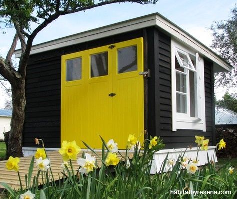 Black for the home is a trend that has staying power. This home shows how versatile is it - just add a pop of yellow! Recycled House, Tea Houses, Build Your Own Shed, Shed Colours, Backyard Sheds, Rental House, Property Design, Bumble Bees, Front Door Colors